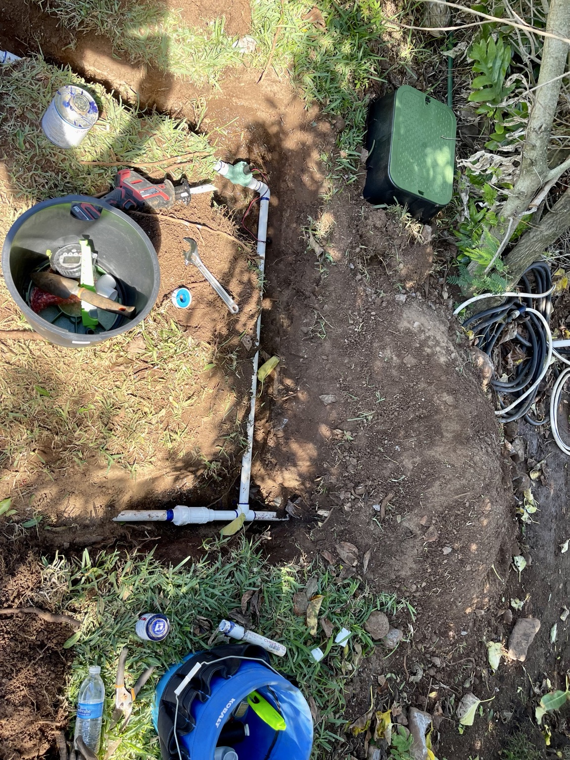 Overhead view of an irrigation mainline PVC repair