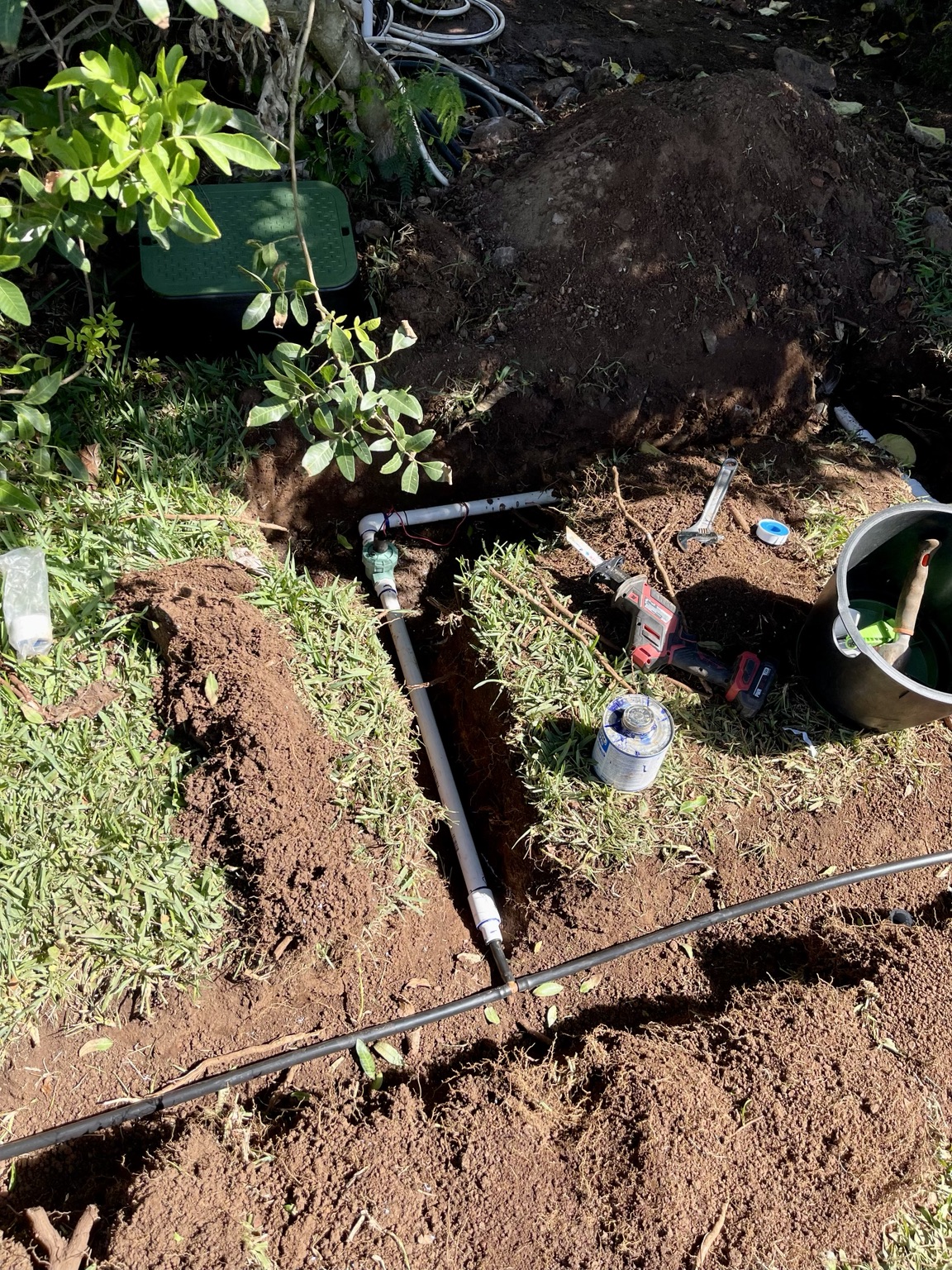 Underground irrigation line and valve installation