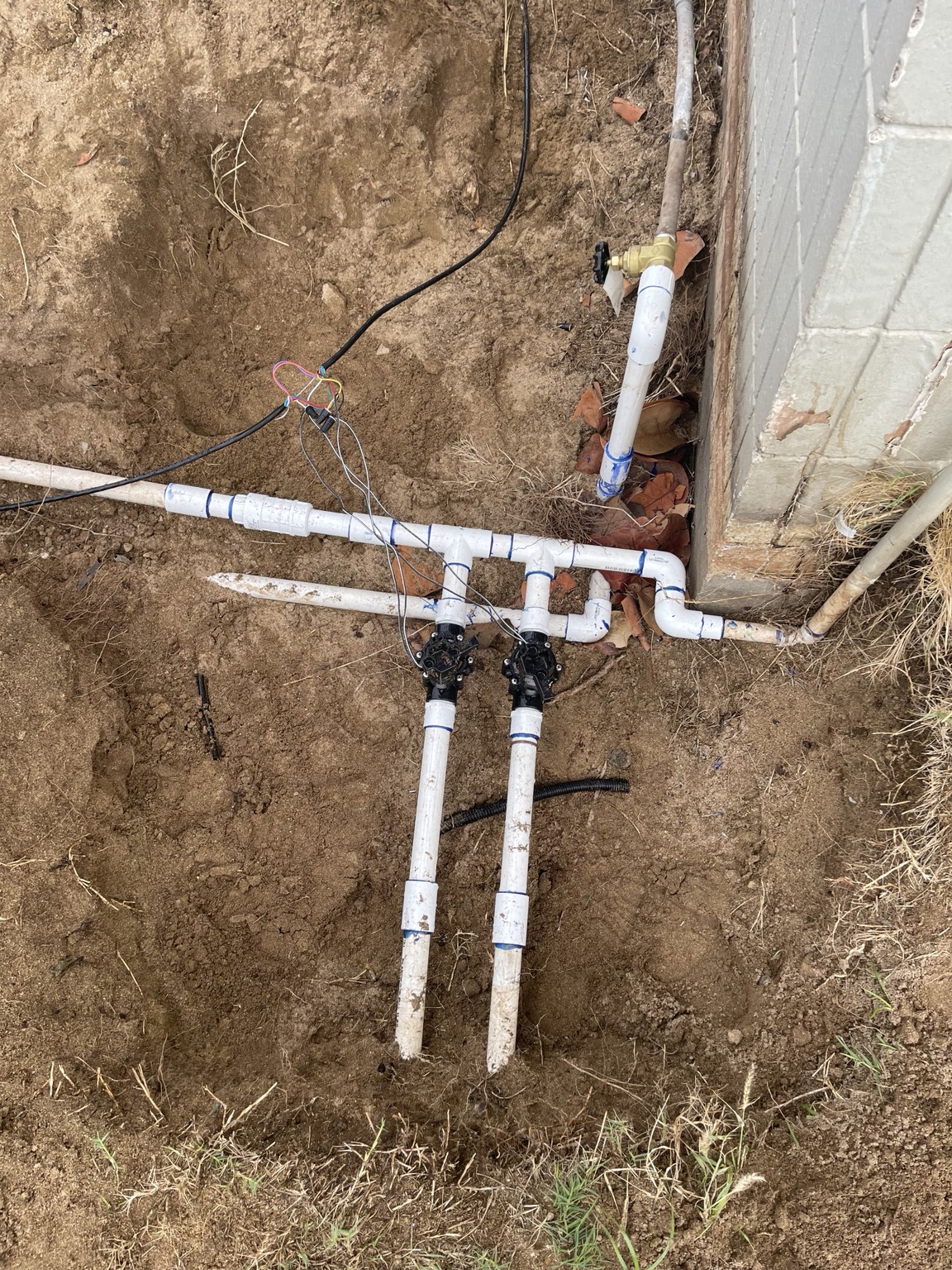 Repaired PVC valve manifold with fresh solvent-welded joints in West Richland